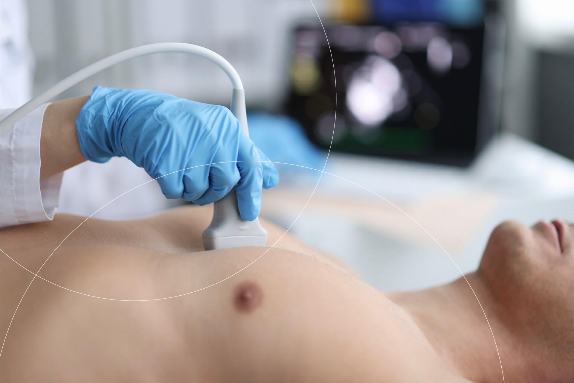 A healthcare professional performing an echocardiography examination on a male patient, showcasing the ultrasound probe in use on the patient's chest with the echocardiogram display in the background.