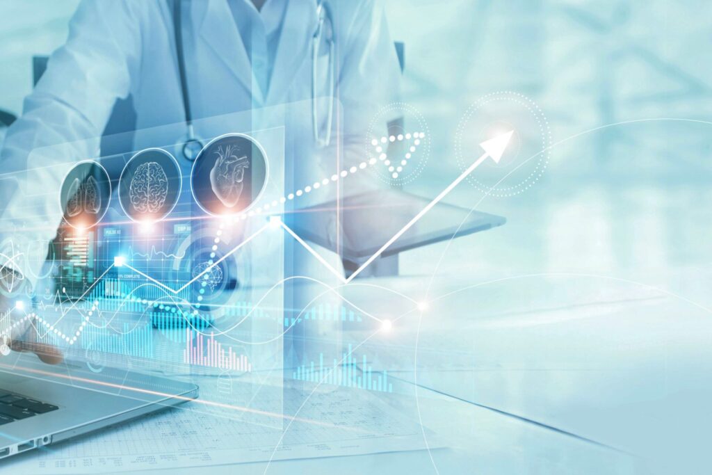 Image depicting biostatisticians analyzing cardiovascular clinical trial data on computer screens.