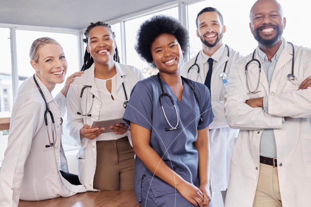 Group of hospital personnel in a discussion, symbolizing SCIRENT's expertise in site management for cardiovascular clinical trials, ensuring optimal site performance and adherence to international standards across Europe